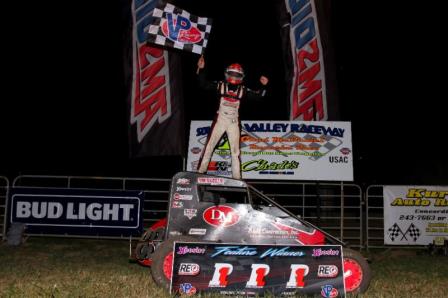 Kevin Thomas, Jr. celebrates his 2nd "Chad McDaniel Memorial" win Wednesday at Solomon Valley Raceway in Beloit, Kansas. (Rich Forman Photo)