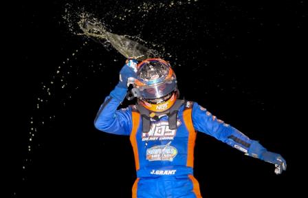 Justin Grant celebrates his first USAC P1 Insurance National Midget victory of the year Saturday night at Jefferson County Speedway in Fairbury, Nebraska (Rich Forman Photo)