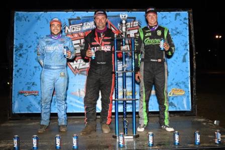 Dave Darland (middle) celebrates his 19th NOS Energy Drink "Indiana Sprint Week" victory Thursday at Lincoln Park Speedway alongside 2nd place finisher Chris Windom (left) & 3rd place A.J. Hopkins (right). (David Nearpass Photo)