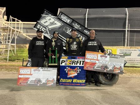 Aaron Reutzel won $20,000 plus a $10,000 bonus in Thursday night's race at Attica
